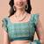 Women's teal floral print chiffon saree with unstitched blouse piece