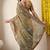 Women's mustard embellished silk blend saree with unstitched blouse piece