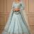 skyblue foil mirror embroidered net lehenga choli with silk blouse set