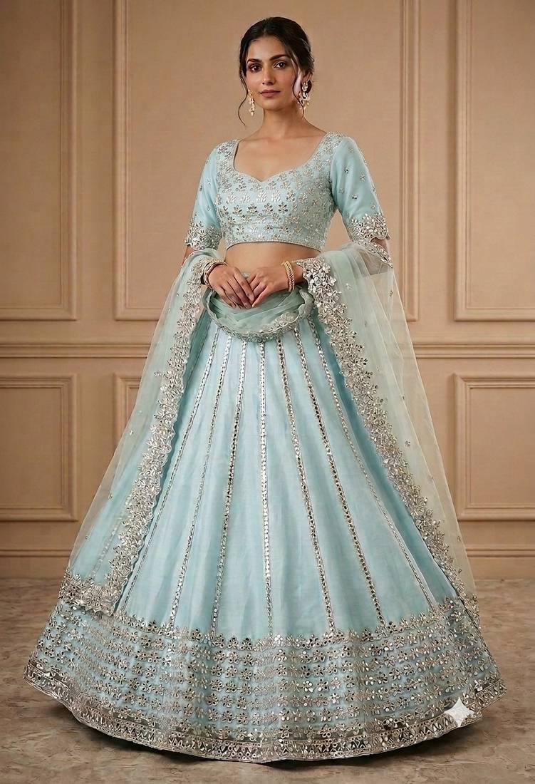 skyblue foil mirror embroidered net lehenga choli with silk blouse set
