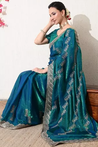 Women's blue embellished silk blend saree with unstitched blouse piece
