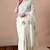 Women's white floral print georgette saree with unstitched blouse piece