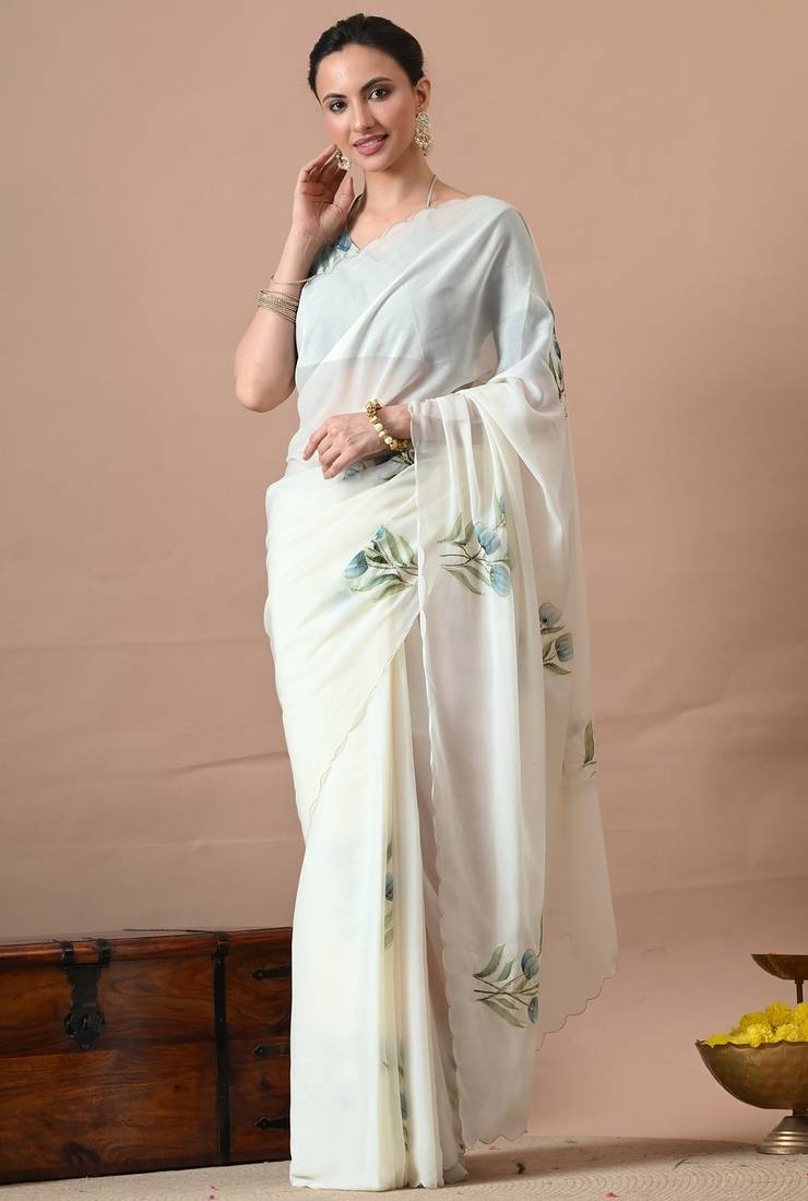 Women's white floral print georgette saree with unstitched blouse piece