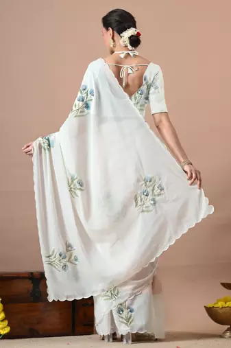 Women's white floral print georgette saree with unstitched blouse piece