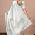 Women's white floral print georgette saree with unstitched blouse piece