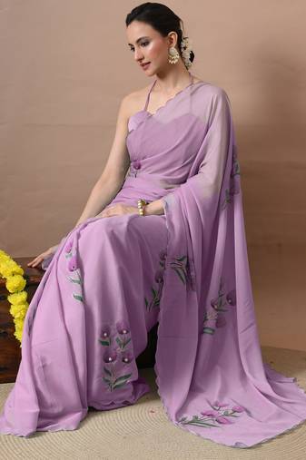 Women's magenta floral print georgette saree with unstitched blouse piece