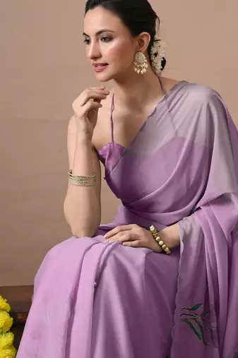 Women's magenta floral print georgette saree with unstitched blouse piece