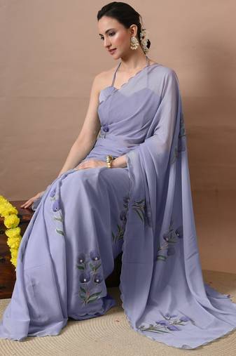 Women's lavender floral print georgette saree with unstitched blouse piece
