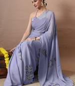 Women's lavender floral print georgette saree with unstitched blouse piece