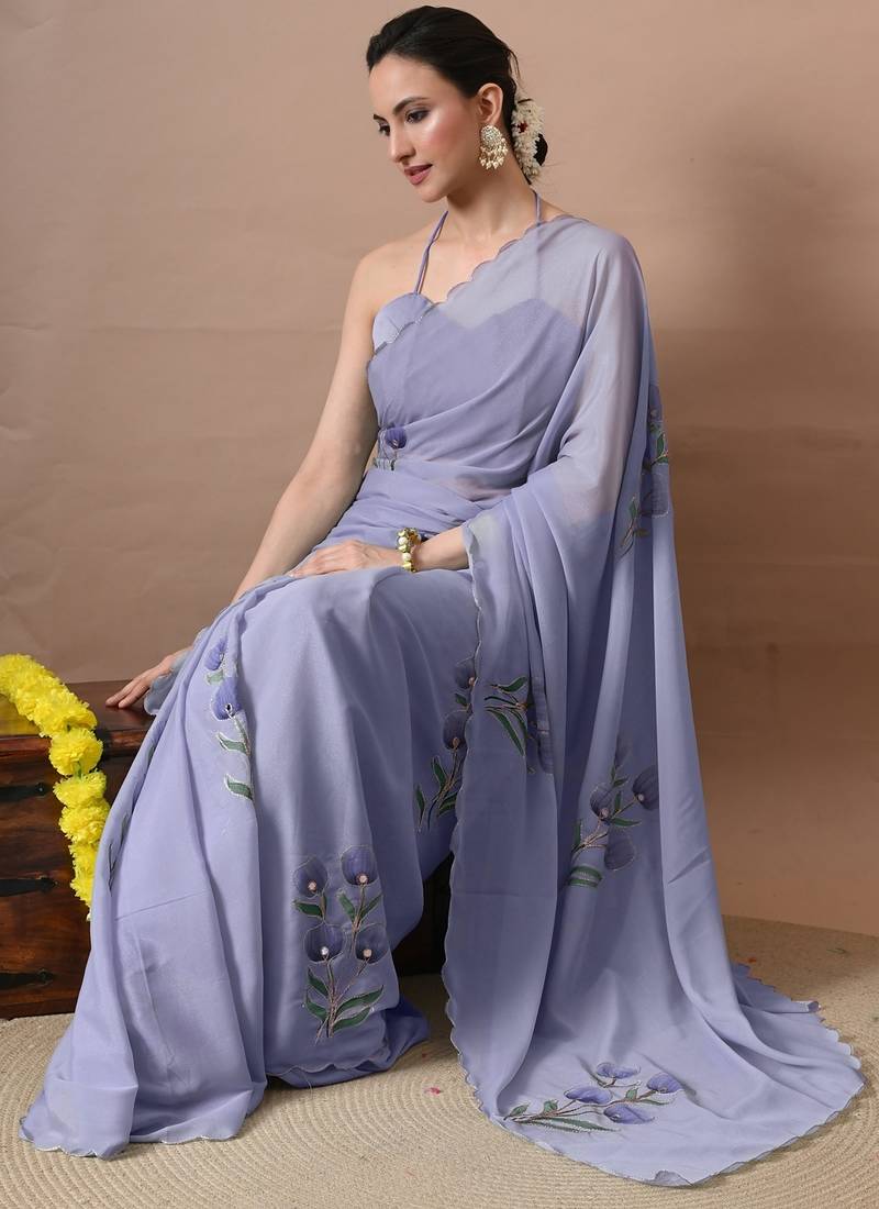 Women's lavender floral print georgette saree with unstitched blouse piece