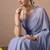 Women's lavender floral print georgette saree with unstitched blouse piece