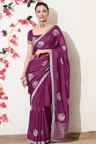Women's magenta embellished georgette saree with unstitched blouse piece