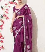Women's magenta embellished georgette saree with unstitched blouse piece