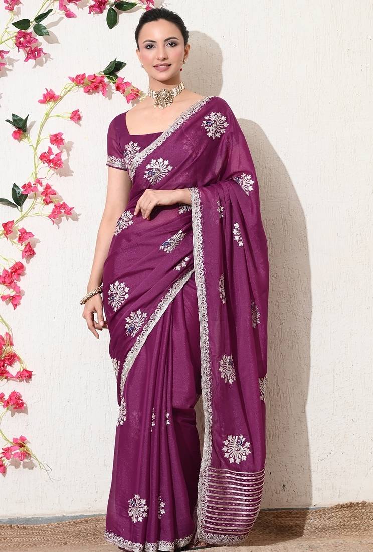 Women's magenta embellished georgette saree with unstitched blouse piece