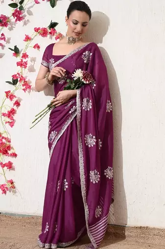 Women's magenta embellished georgette saree with unstitched blouse piece