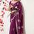 Women's magenta embellished georgette saree with unstitched blouse piece