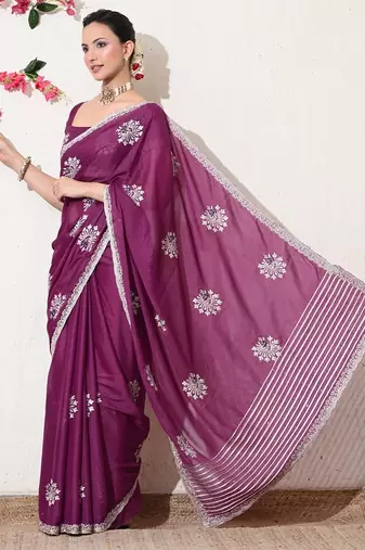 Women's magenta embellished georgette saree with unstitched blouse piece