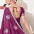 Women's magenta embellished georgette saree with unstitched blouse piece