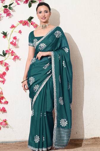 Women's green embellished georgette saree with unstitched blouse piece