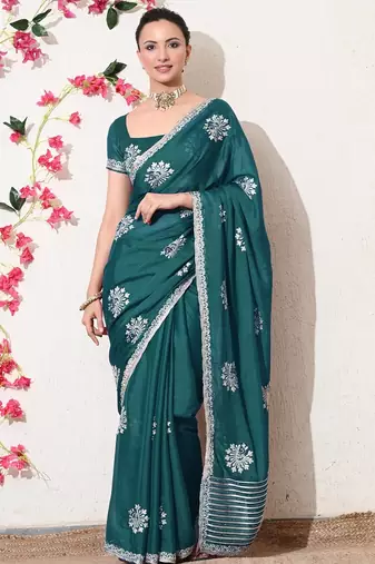 Women's green embellished georgette saree with unstitched blouse piece