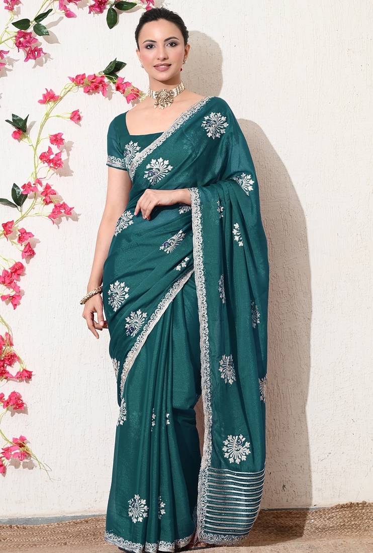 Women's green embellished georgette saree with unstitched blouse piece