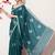 Women's green embellished georgette saree with unstitched blouse piece