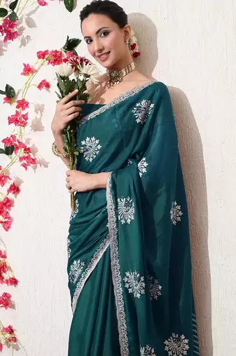 Women's green embellished georgette saree with unstitched blouse piece