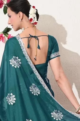 Women's green embellished georgette saree with unstitched blouse piece