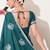 Women's green embellished georgette saree with unstitched blouse piece