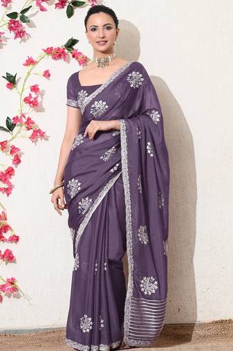 Women's purple embellished georgette saree with unstitched blouse piece