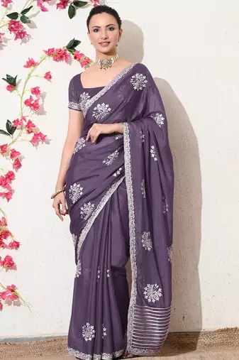 Women's purple embellished georgette saree with unstitched blouse piece