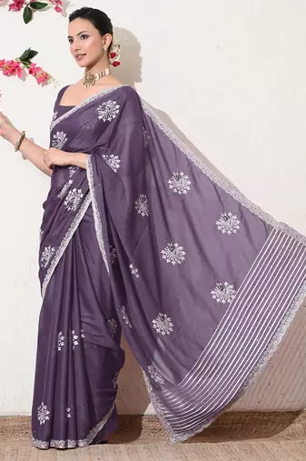 Women's purple embellished georgette saree with unstitched blouse piece