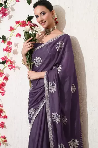 Women's purple embellished georgette saree with unstitched blouse piece