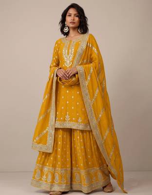 Yellow heavy silk blend  classic embroidered party wear salwar suit 1