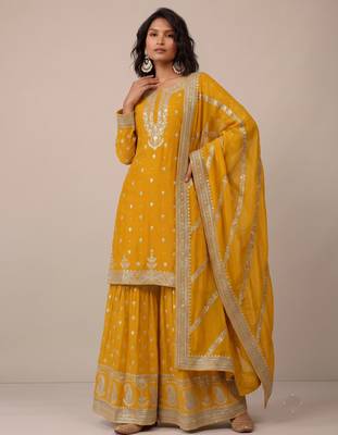 Yellow heavy silk blend  classic embroidered party wear salwar suit 2