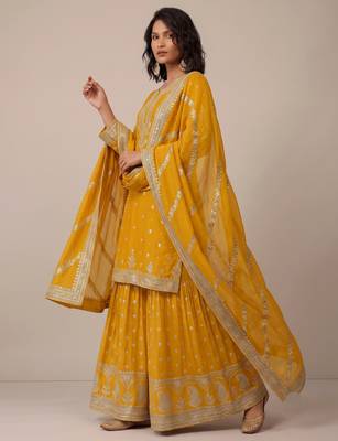 Yellow heavy silk blend  classic embroidered party wear salwar suit 3