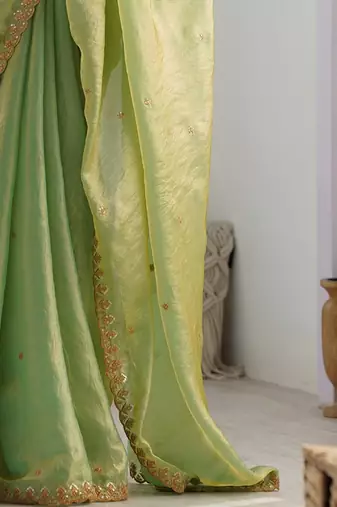 embellished sequinned tissue saree with blouse 