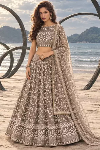 CHOCOLATE BROWN NET THREAD WITH ZARI AND SEQUINCE WORK FESTIVE LEHENGA CHOLI SET FOR WOMEN'S