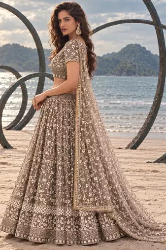 CHOCOLATE BROWN NET THREAD WITH ZARI AND SEQUINCE WORK FESTIVE LEHENGA CHOLI SET FOR WOMEN'S
