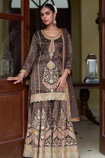 Coffee brown silk blend zari sequins  and embroidery work with floral motifs contrast border. semi stitched suit