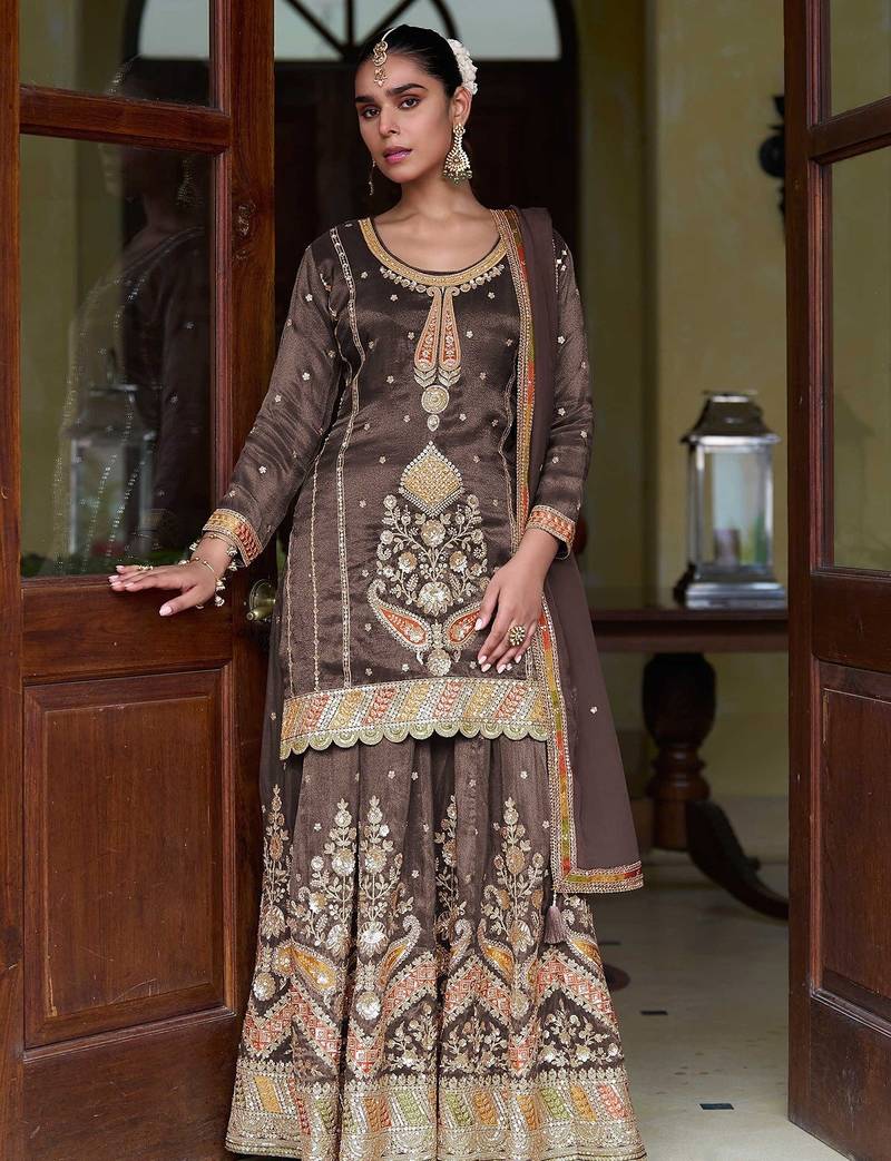 Coffee brown silk blend zari sequins  and embroidery work with floral motifs contrast border. semi stitched suit