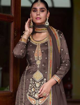Coffee brown silk blend zari sequins  and embroidery work with floral motifs contrast border. semi stitched suit 2