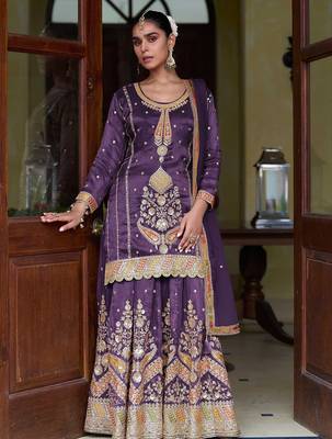 Deep purple silk blend zari sequins  and embroidery work with floral motifs contrast border. semi stitched suit 1