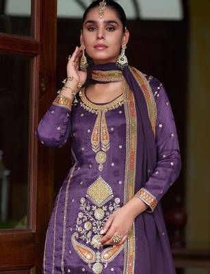 Deep purple silk blend zari sequins  and embroidery work with floral motifs contrast border. semi stitched suit 2