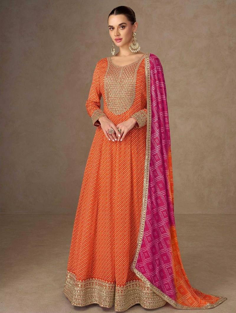 orange chiffon heavy golden zari embroidery and sequin work semi stitched suit