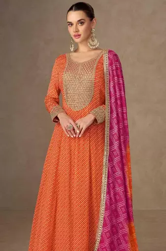 orange chiffon heavy golden zari embroidery and sequin work semi stitched suit