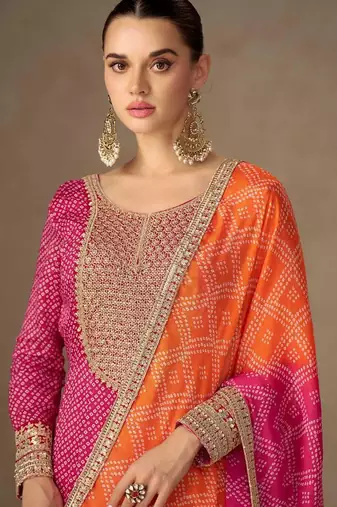 pink chiffon heavy golden zari embroidery and sequin work semi stitched suit
