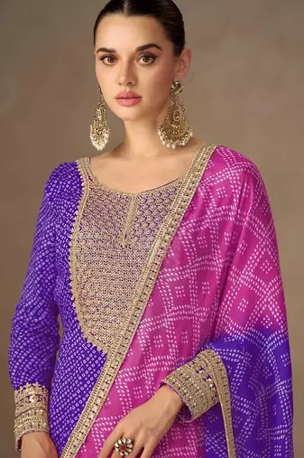 purple chiffon heavy golden zari embroidery and sequin work semi stitched suit