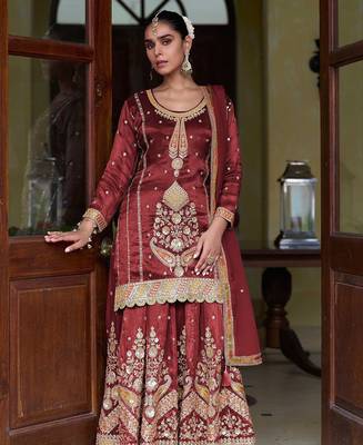 maroon silk blend zari sequined and embroidery work with floral motifs and detailed contrast border. semi stitched suit 1