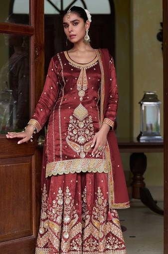 maroon silk blend zari sequined and embroidery work with floral motifs and detailed contrast border. semi stitched suit